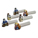 Six Le Merzer porcelain knife holders, 6 cm
