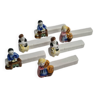 Six Le Merzer porcelain knife holders, 6 cm