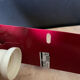 Red metal wall lamp