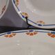 Old semi-deep plates in Terre de fer earthenware