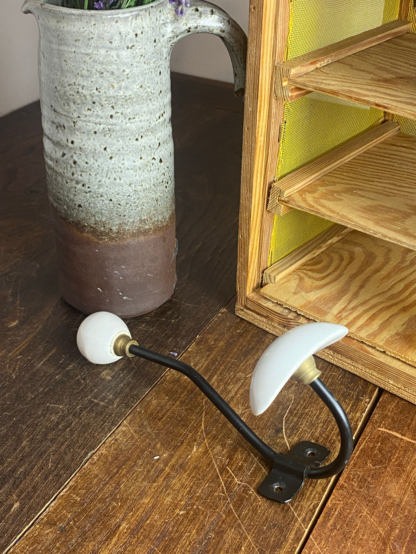 Metal and porcelain hook
