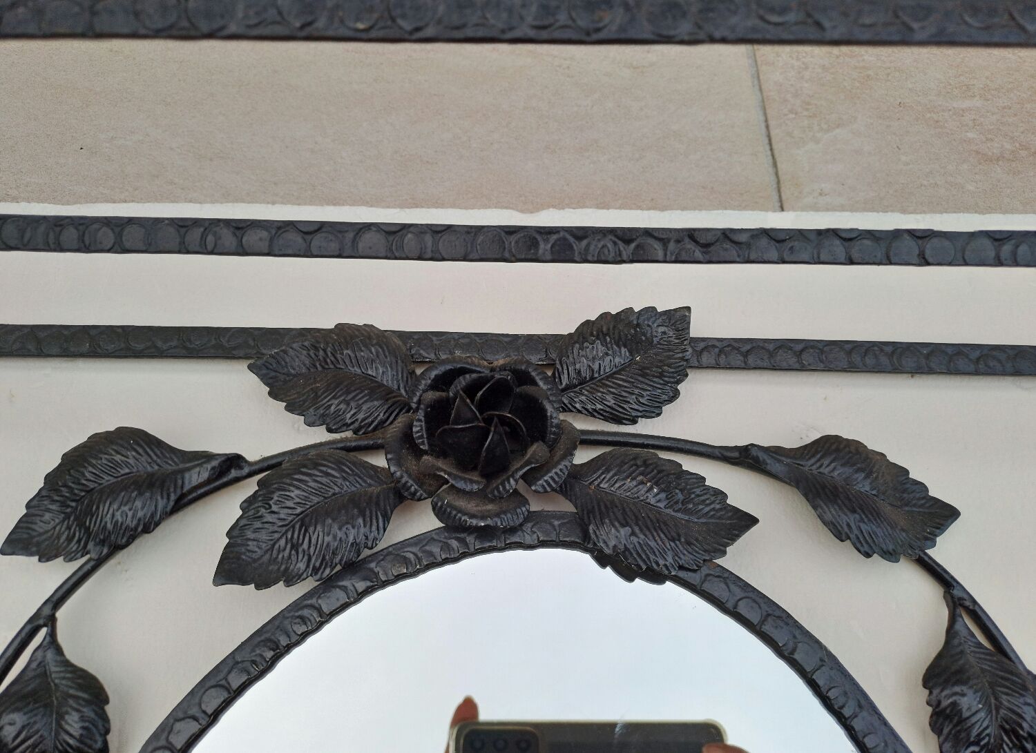 Wrought iron wall coat rack