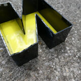 Yellow and black industrial sign letter "N"