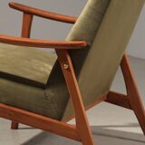 Vintage green velvet armchair