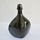 Vase bouteille grès émaillé noir par Roland Zobel