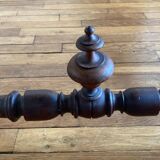 Table with a spacer topped with a spinning top.