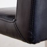 Steel armchair with leather upholstery