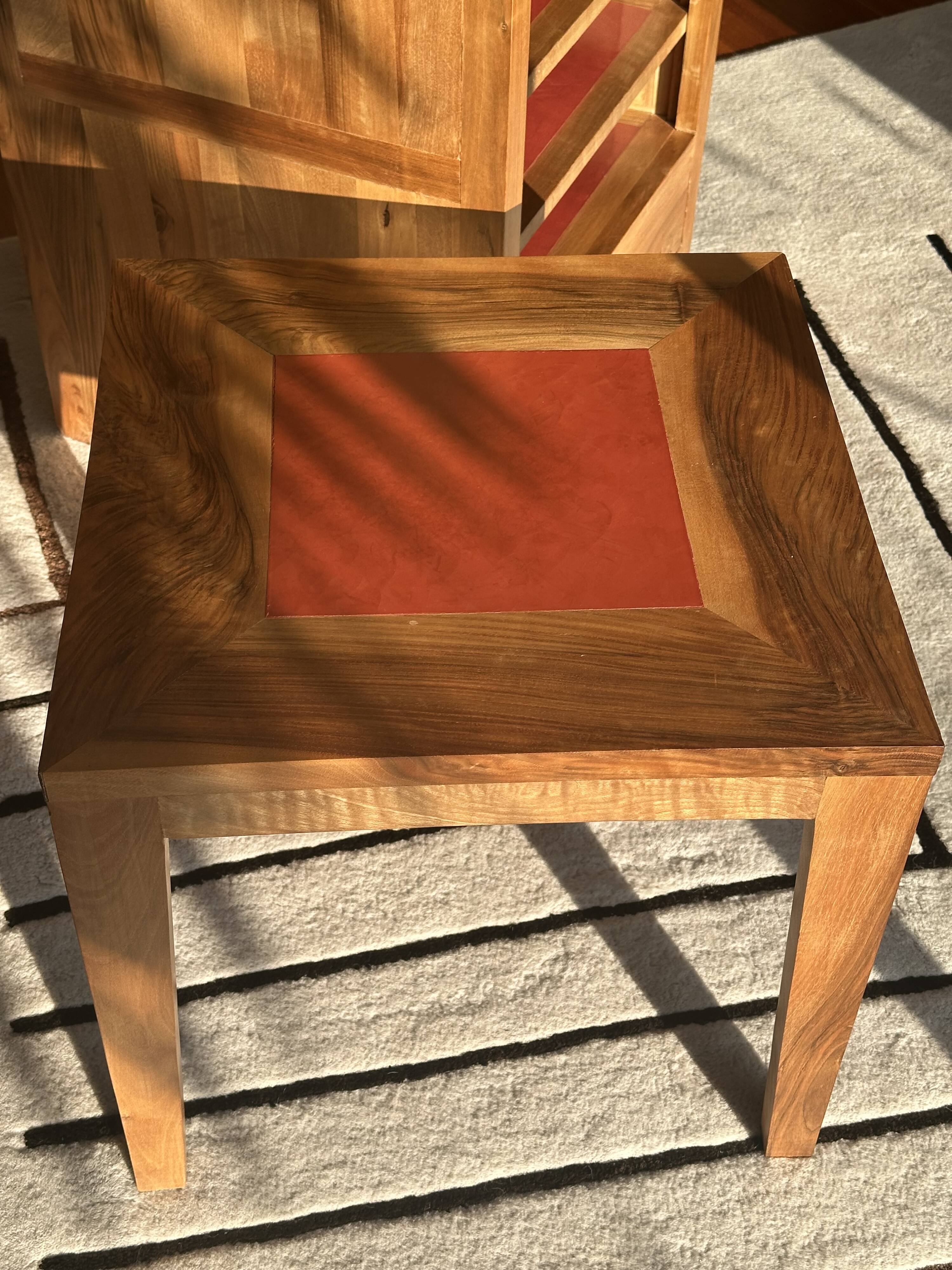 Coffee table in walnut with a tadelakt top.