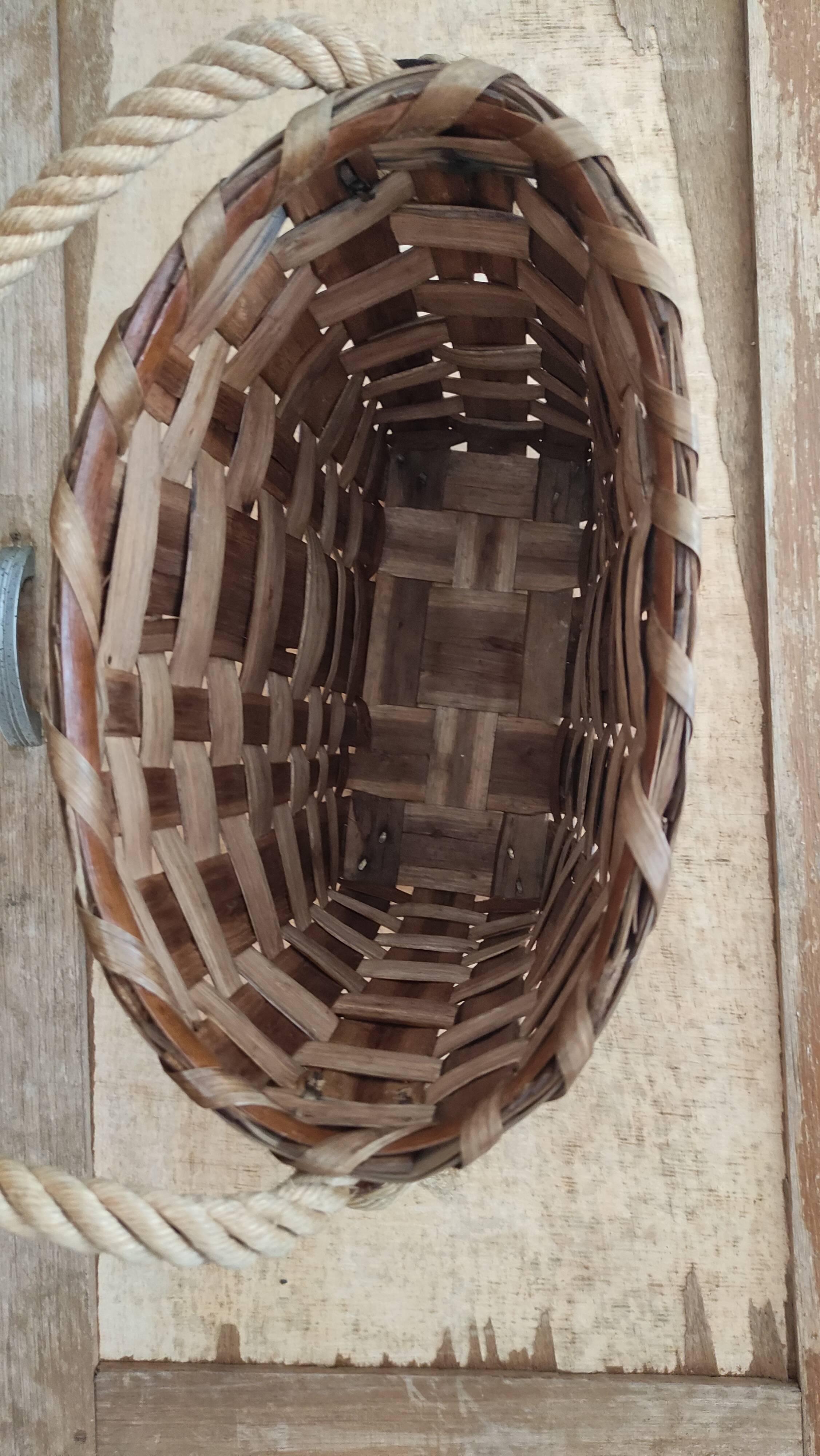 Basket or bag to put or hang leather, rope, brass and rattan