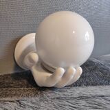 White ceramic hand sconce with white opaline globe