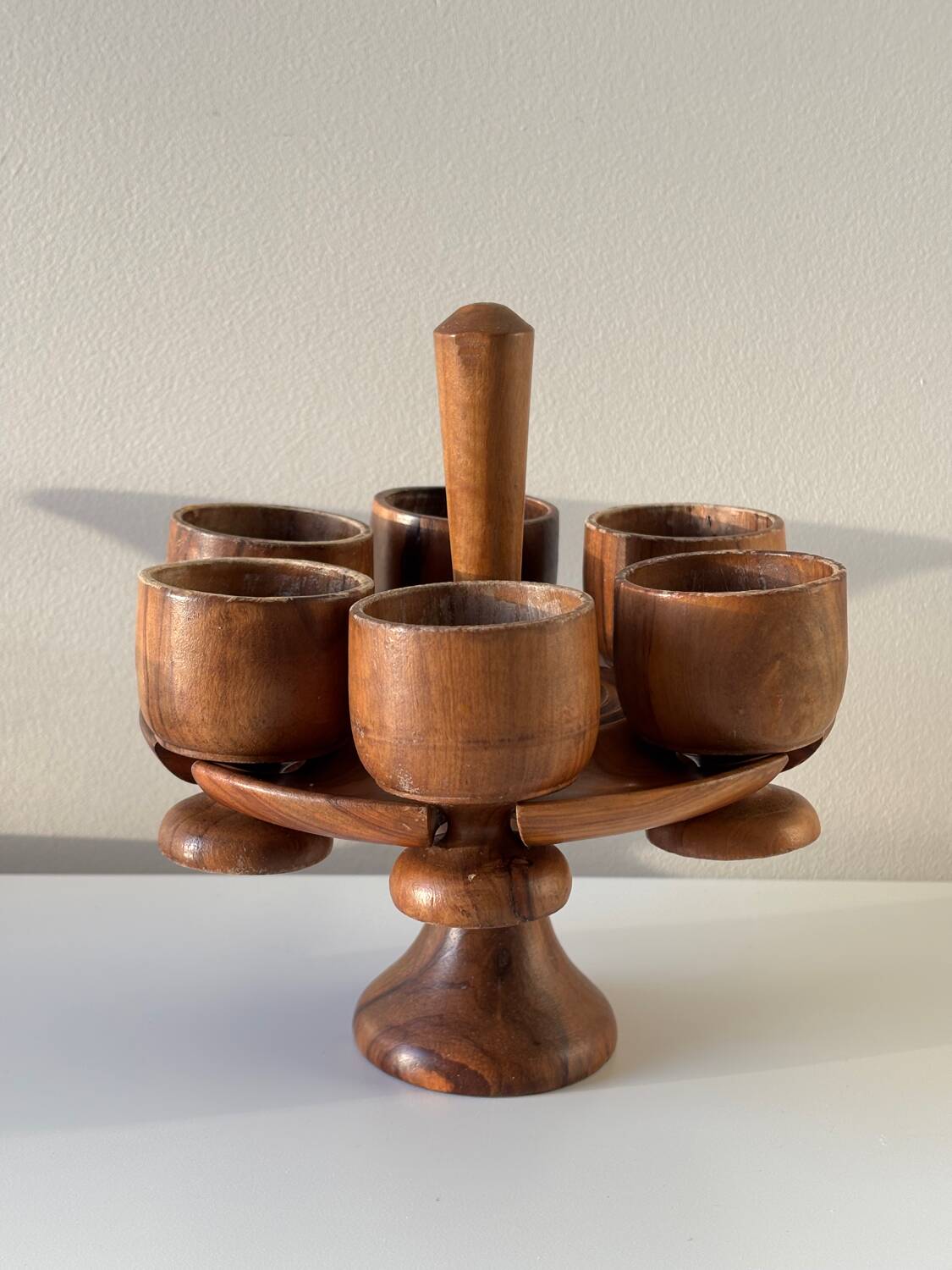 Wooden egg cups on a stand