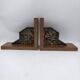 Pair of Breton couple bookends in bronze and wood.