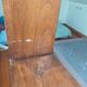 Asymmetrical wall or divider bookcase in dark wood