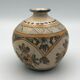 Vintage vase shaped terracotta ball with handheld paint decoration polychrome signed