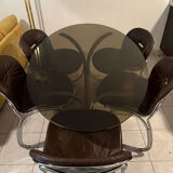 Table and chairs in the style of Gastone Rinaldi.