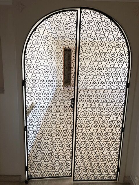 Double wrought iron door