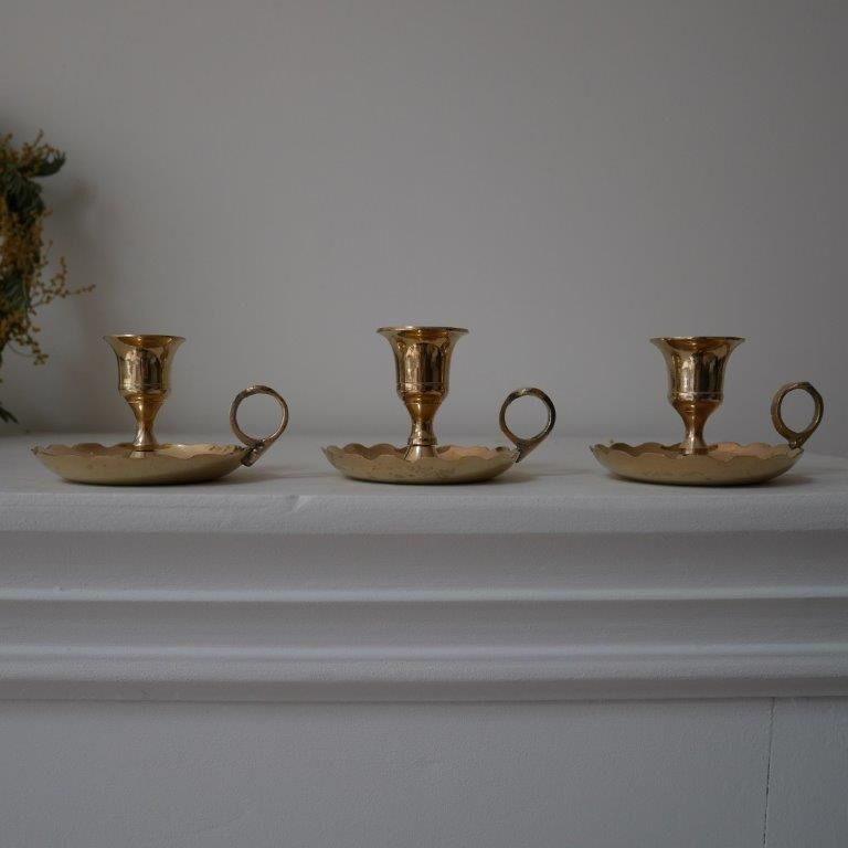 Brass candlesticks, cellar rat models