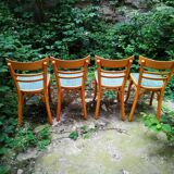 Series of four Baumann bistro chairs