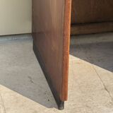 Modernist desk in wood and green moleskin upholstery