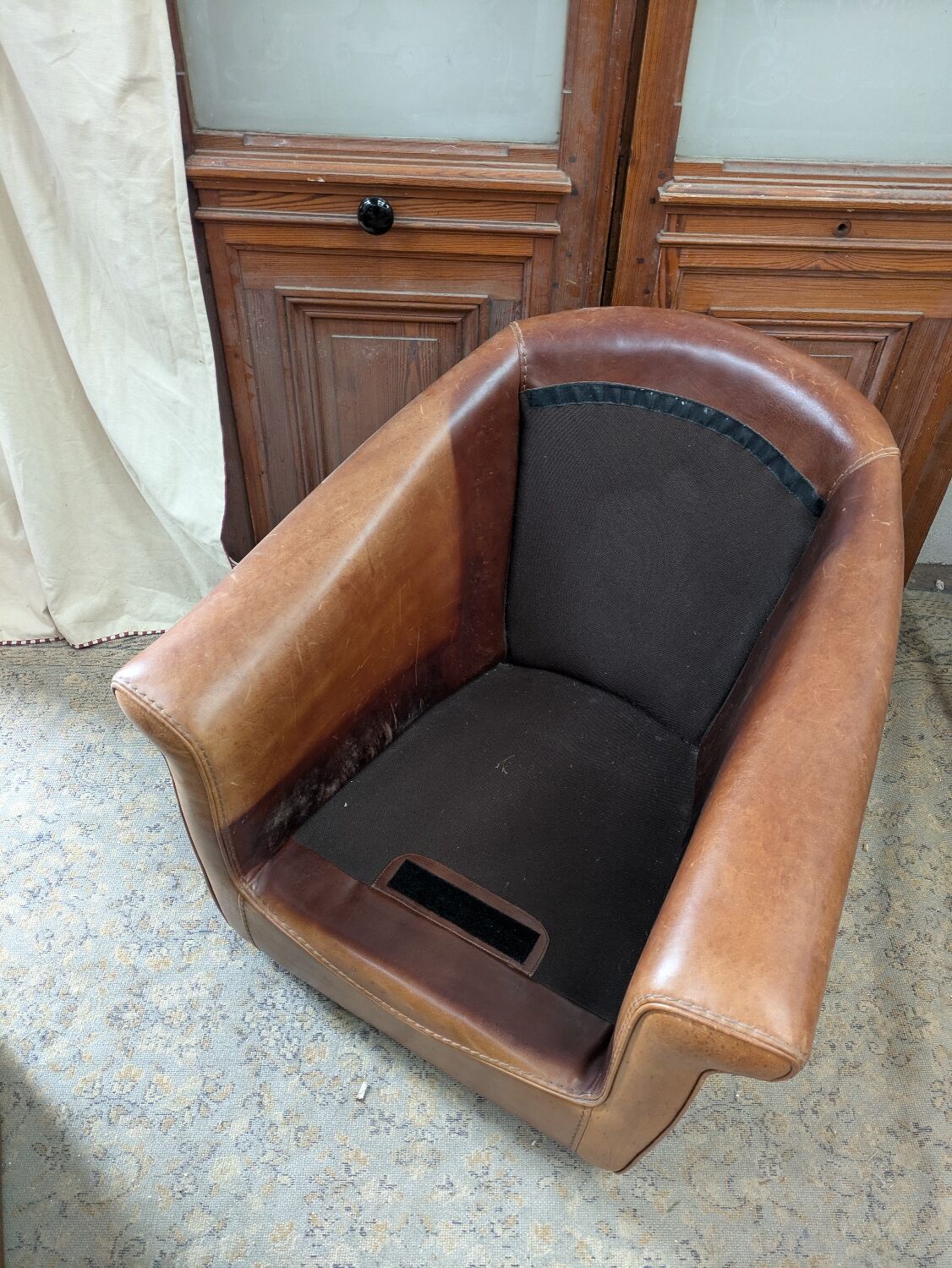 Pair of leather armchairs