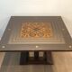 Art Deco centre table with a mirrored eglomisé top in the style of Jules Leleu and Max Ingrand.