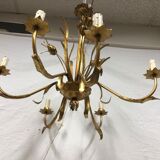 Golden chandelier of the 70s joncs decorations