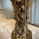 Carved wooden and marble console