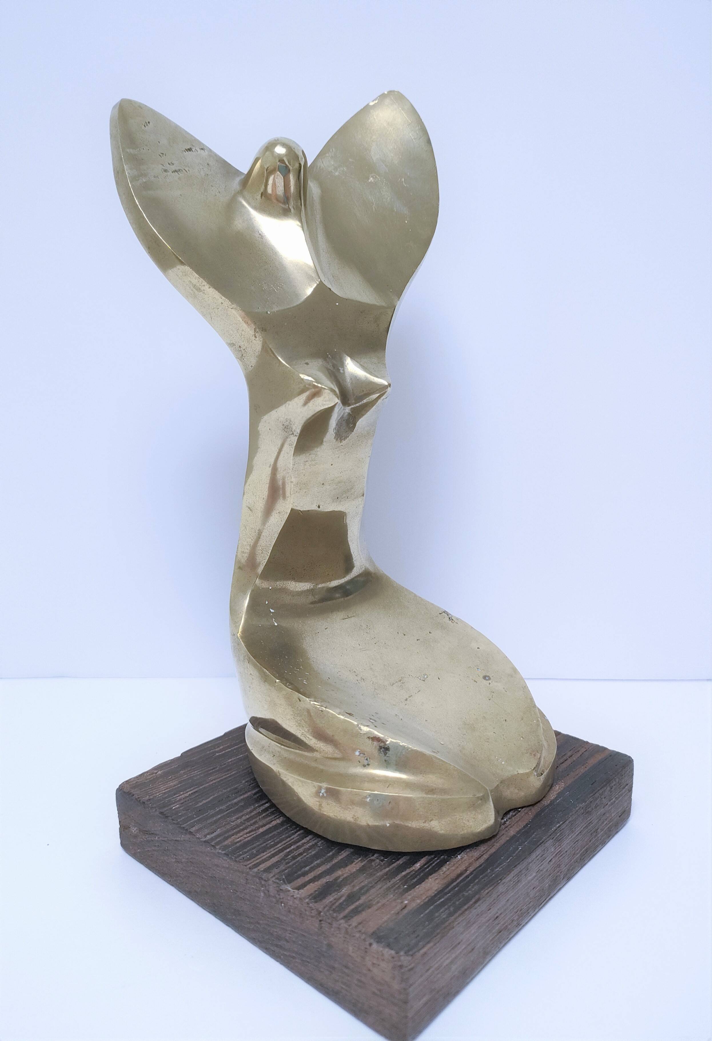 Gilded bronze and sculptural wood paperweight