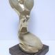 Gilded bronze and sculptural wood paperweight