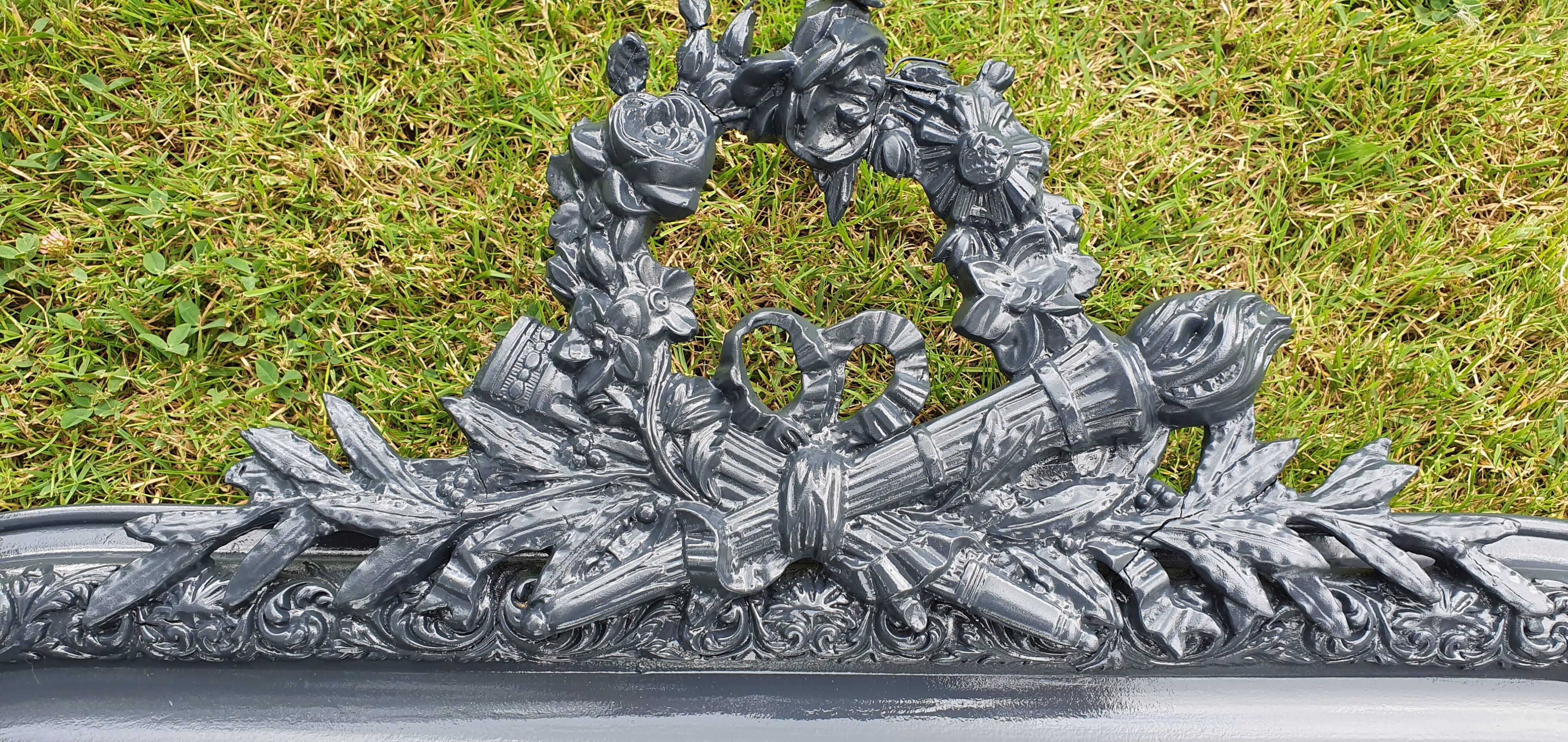 Old mirror Louis Philippe anthracite gray with pricked ice.