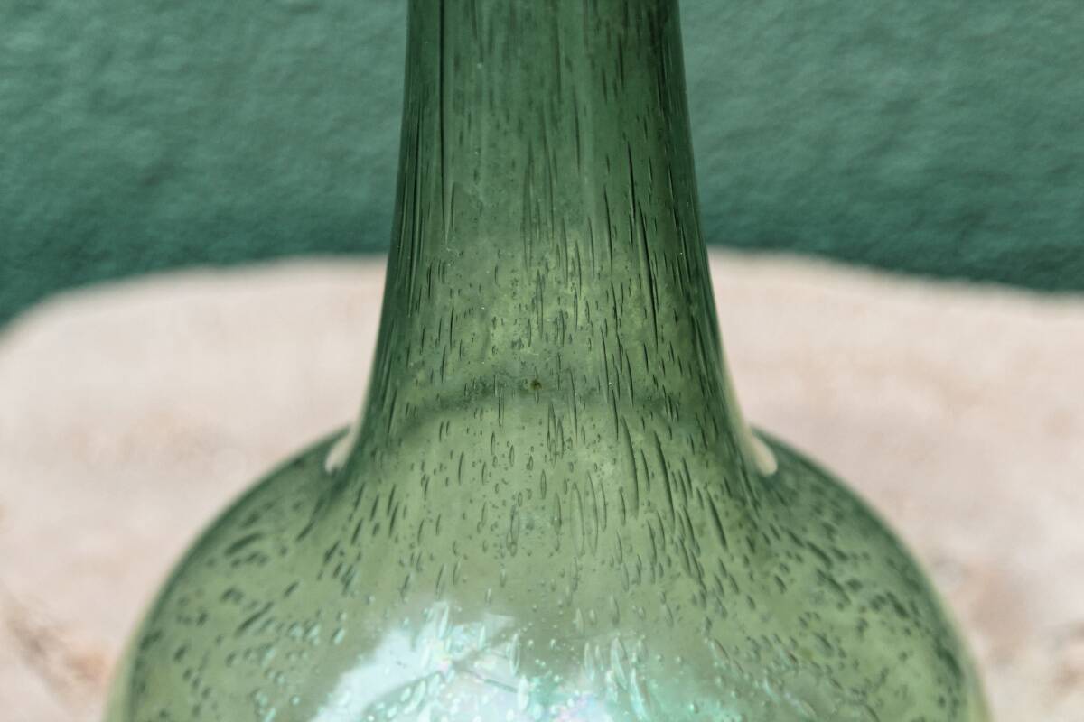 Single-flower vase in blown, bubbled glass, signed Biot