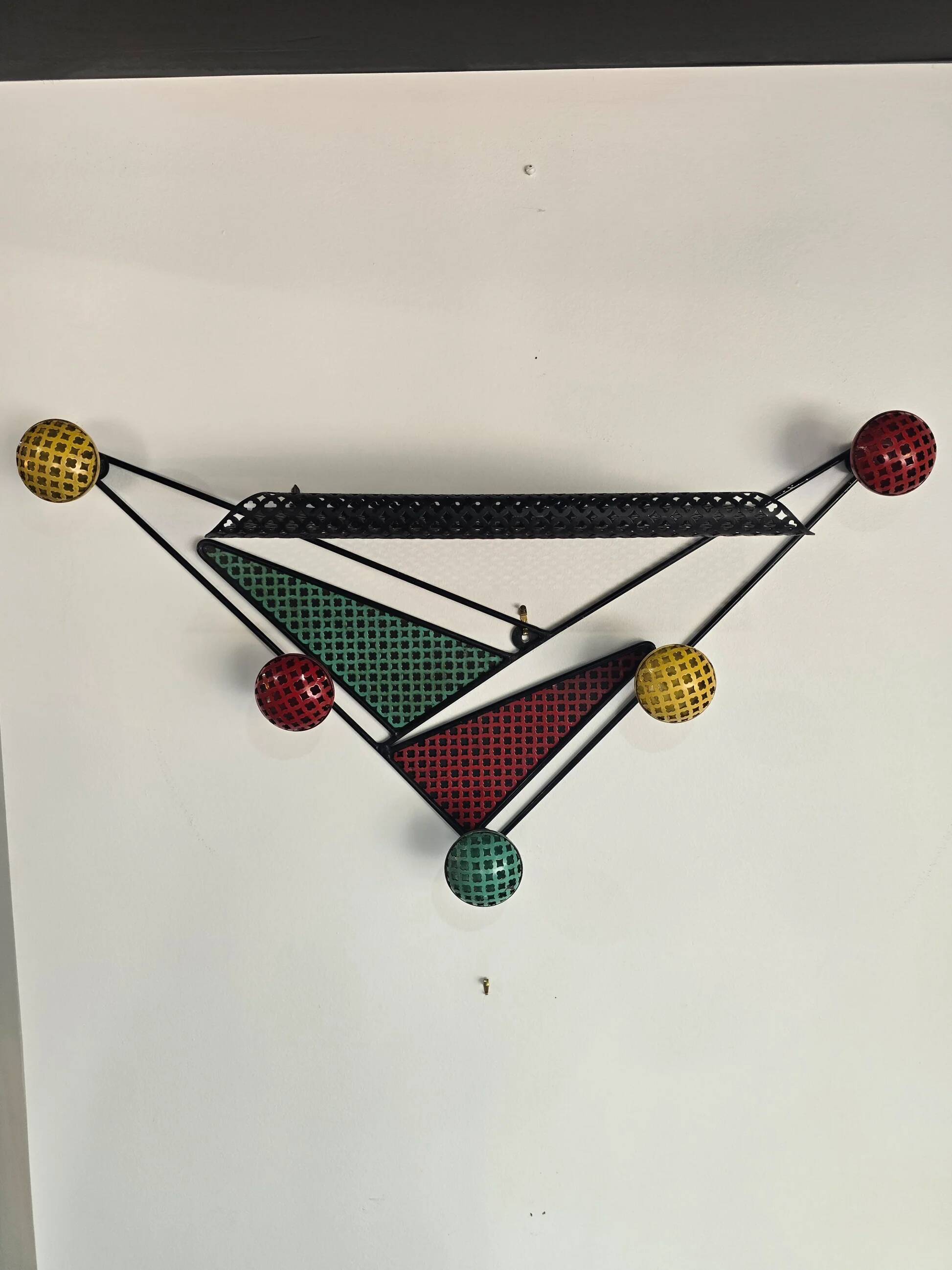 Wall-mounted coat rack attributed to Mathieu Matégot – France, 1950s