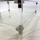 Coffee table in plexiglass, brass and glass top, 1980.