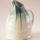 Turquoise and ecru decorative pitcher