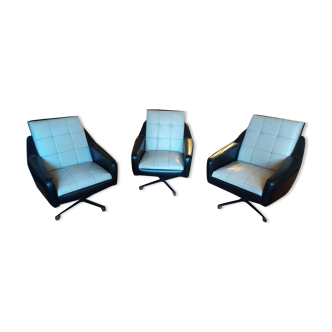 Series of 3 vintage skai two-tone swivel armchairs on central stand. year 60.