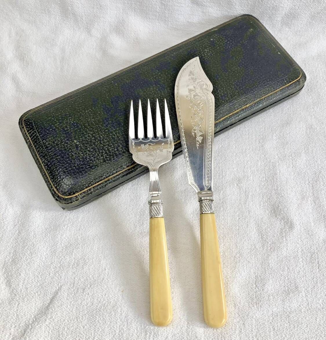 Antique Victorian fish serving cutlery, bone and silver-plated metal