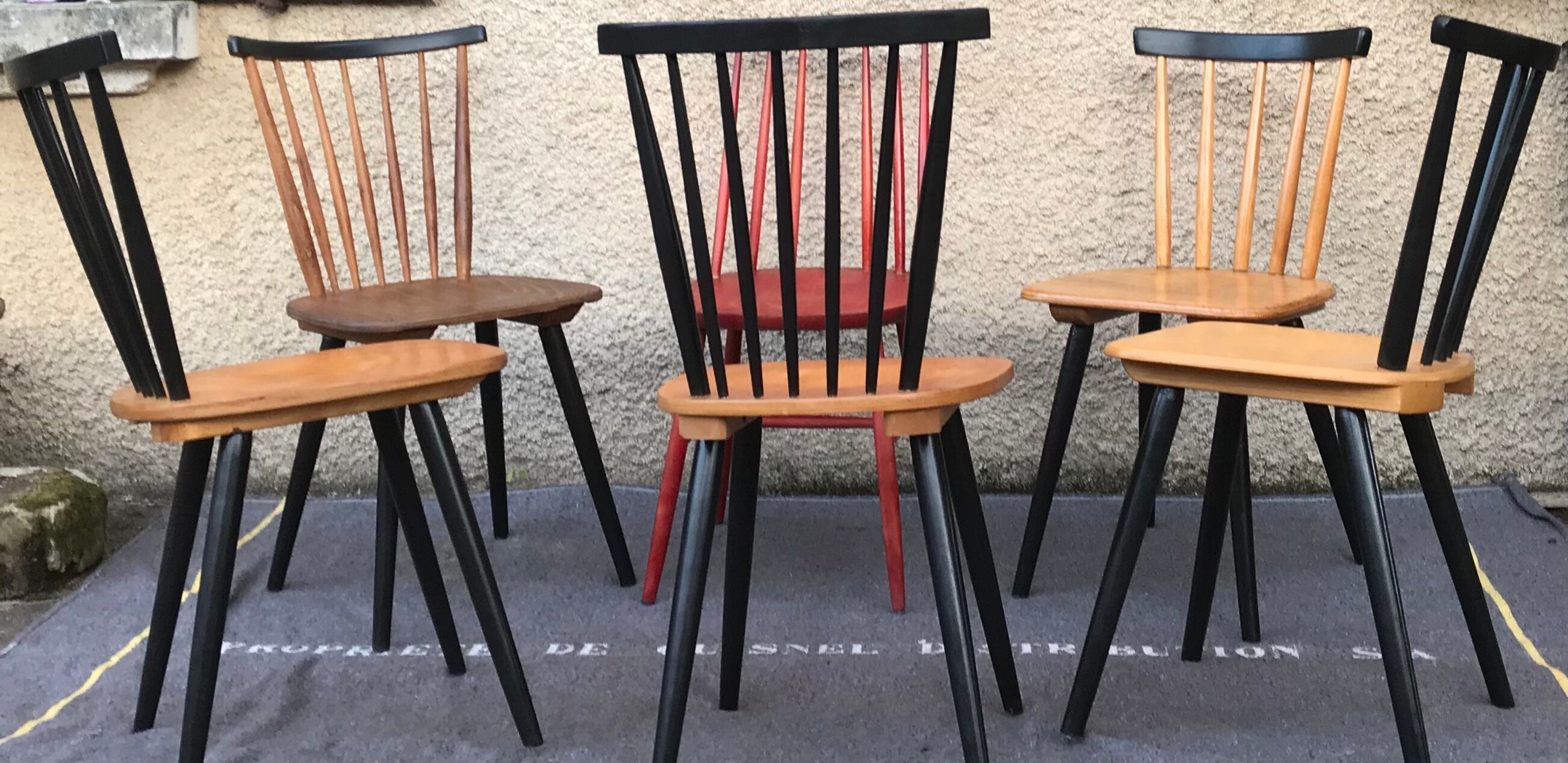 Set of 6 mismatched vintage chairs with bars and compass legs