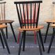 Set of 6 mismatched vintage chairs with bars and compass legs