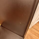 Many brown leather chairs "Roche Bobois"