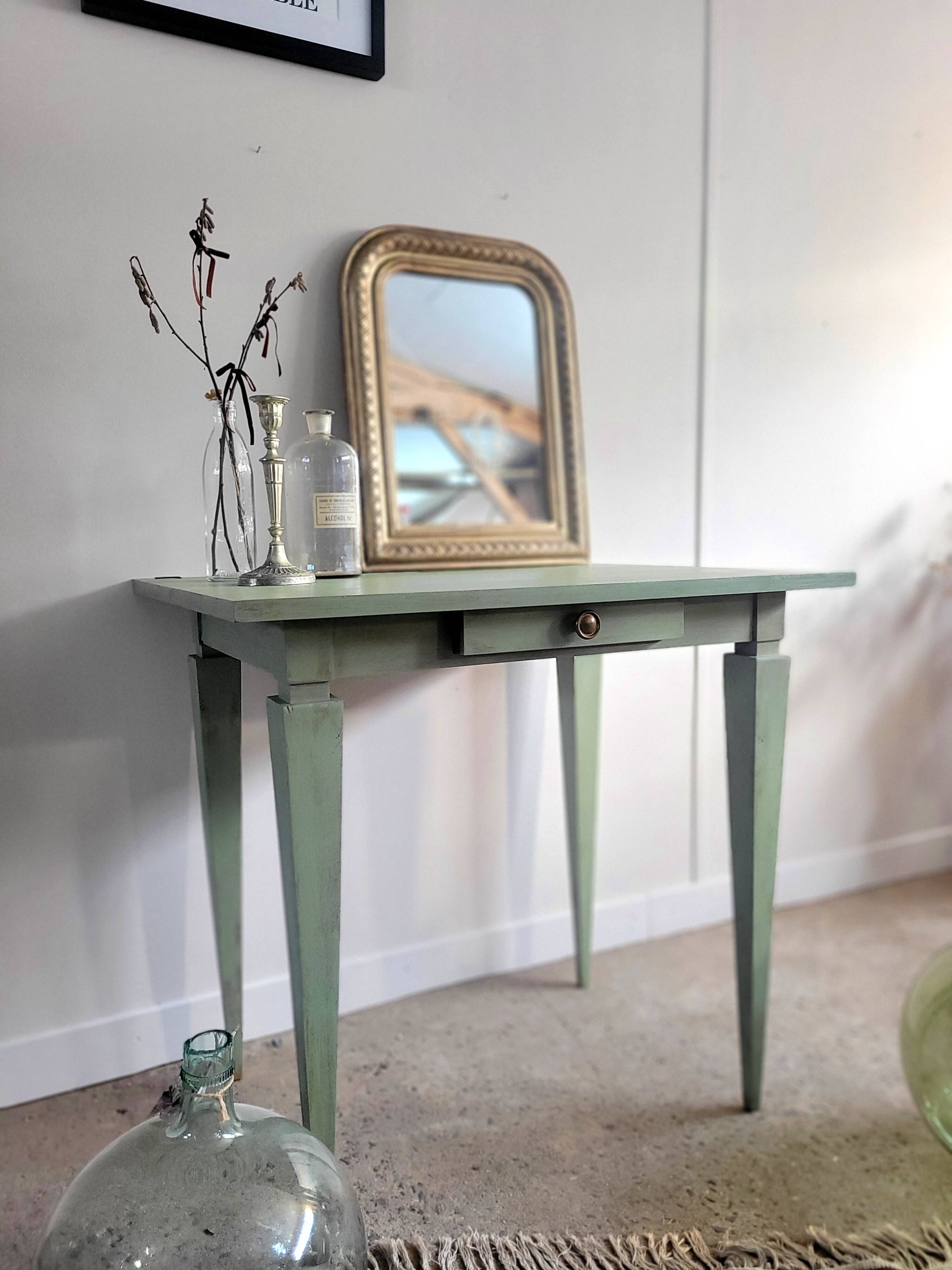 Green side table with tapered legs