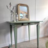 Green side table with tapered legs