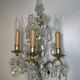19th-century wall sconce, bronze and crystal pendants.