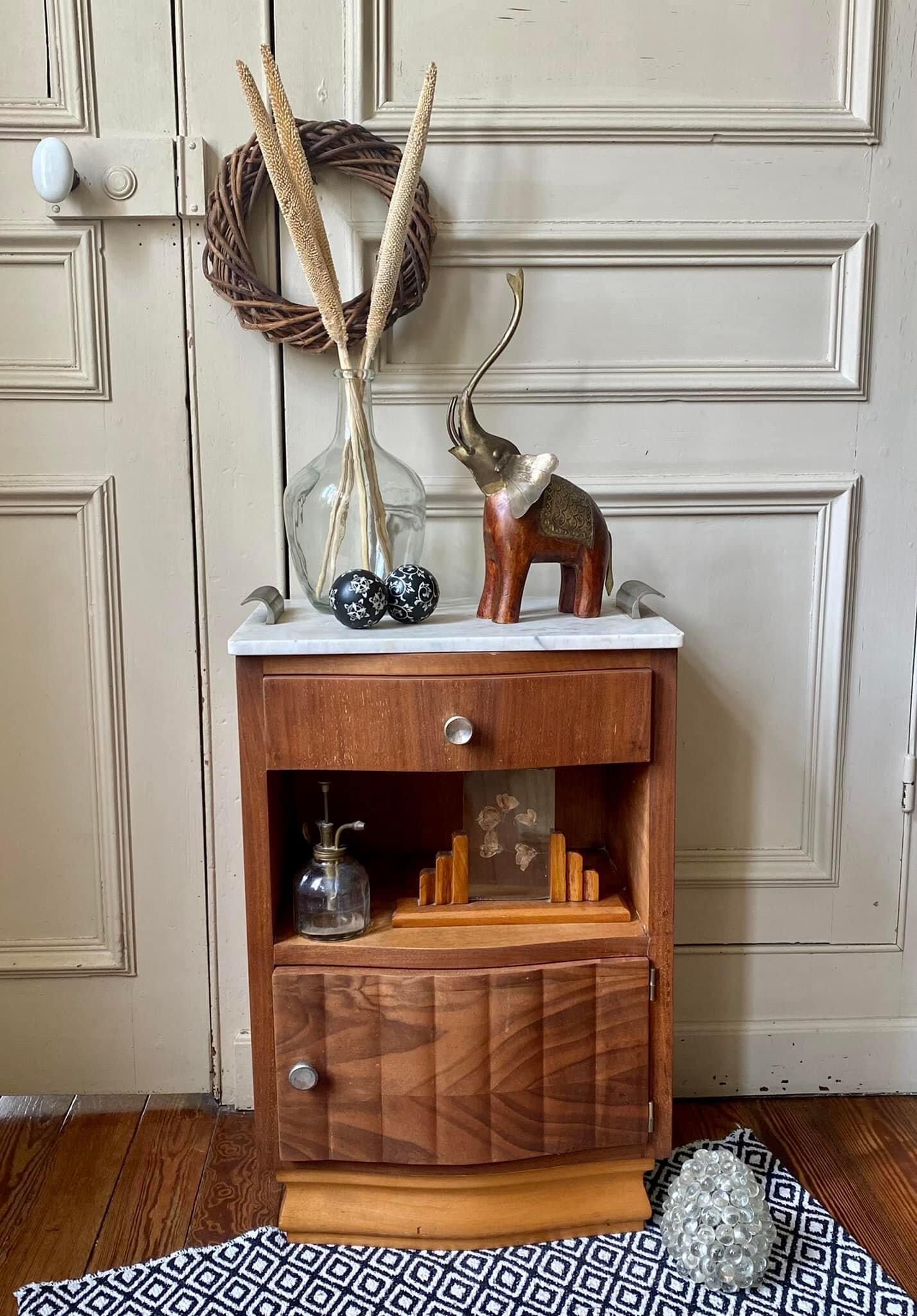 Wooden elephant and brass