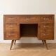 Vintage Scandinavian desk in waxed wood with 7 drawers.