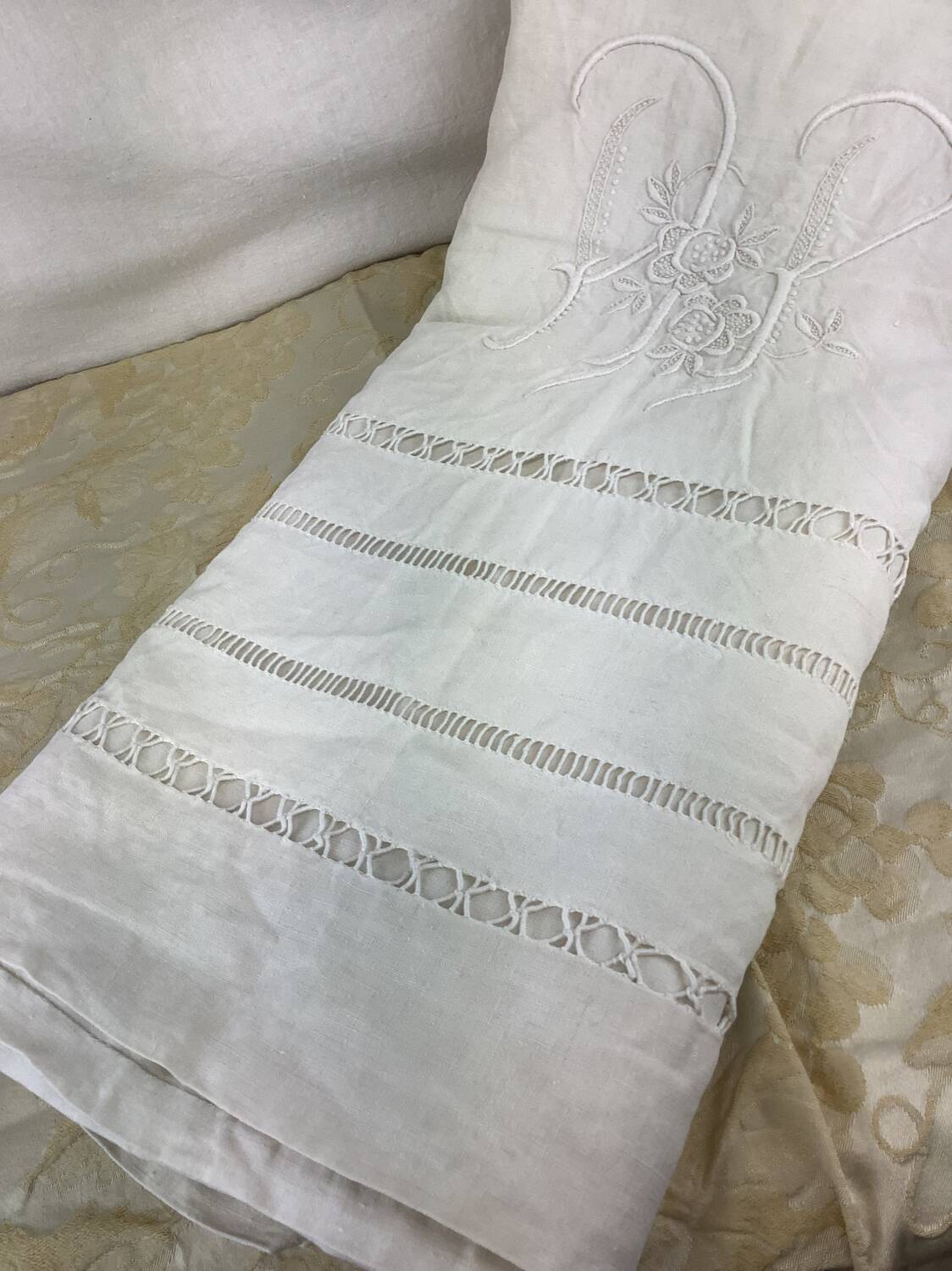 Old linen sheet with monogram embroidery