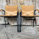 Pair of Vintage RONÉO Armchairs with Black Metal Legs + Curved Wooden Shell