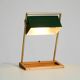 1960s Temde table lamp with a brass frame, teak base, and green lampshade