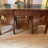 Antique Empire-style desk in burr veneer, green leather, with a dash.