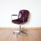 Dark red leather hairdresser's chair