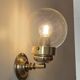 Pair of adjustable wall lights in blown glass and solid brass - modern design
